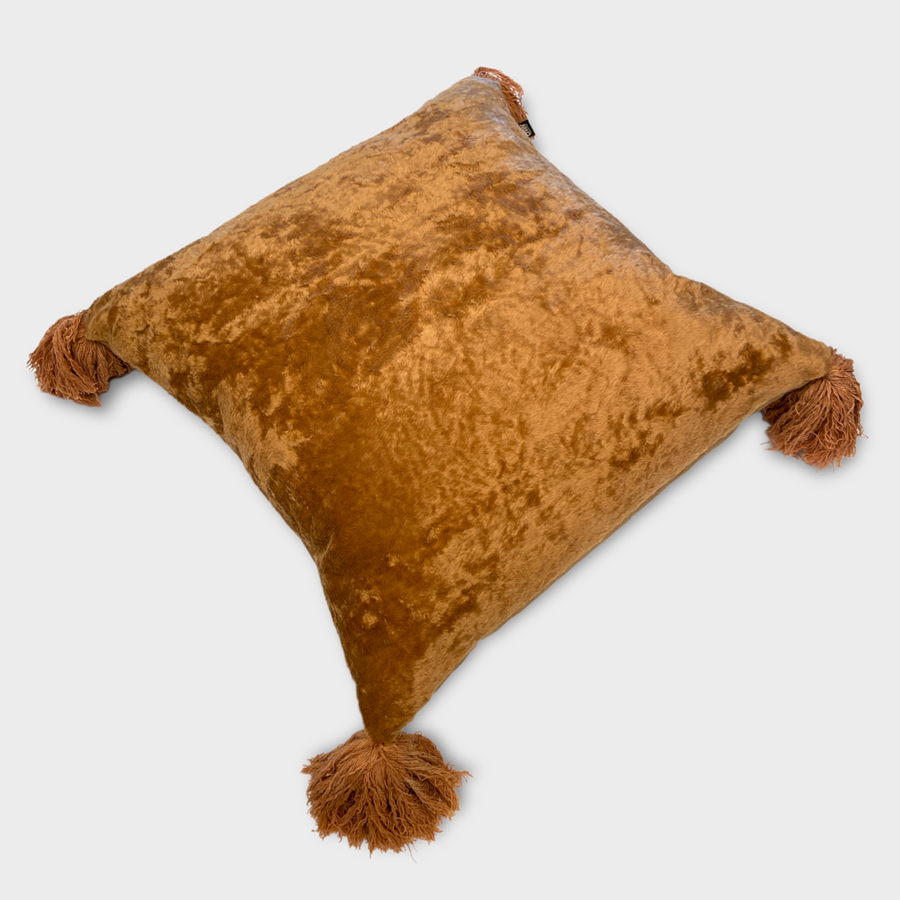 LARGE FAUX PONY PILLOW W/ TASSELS